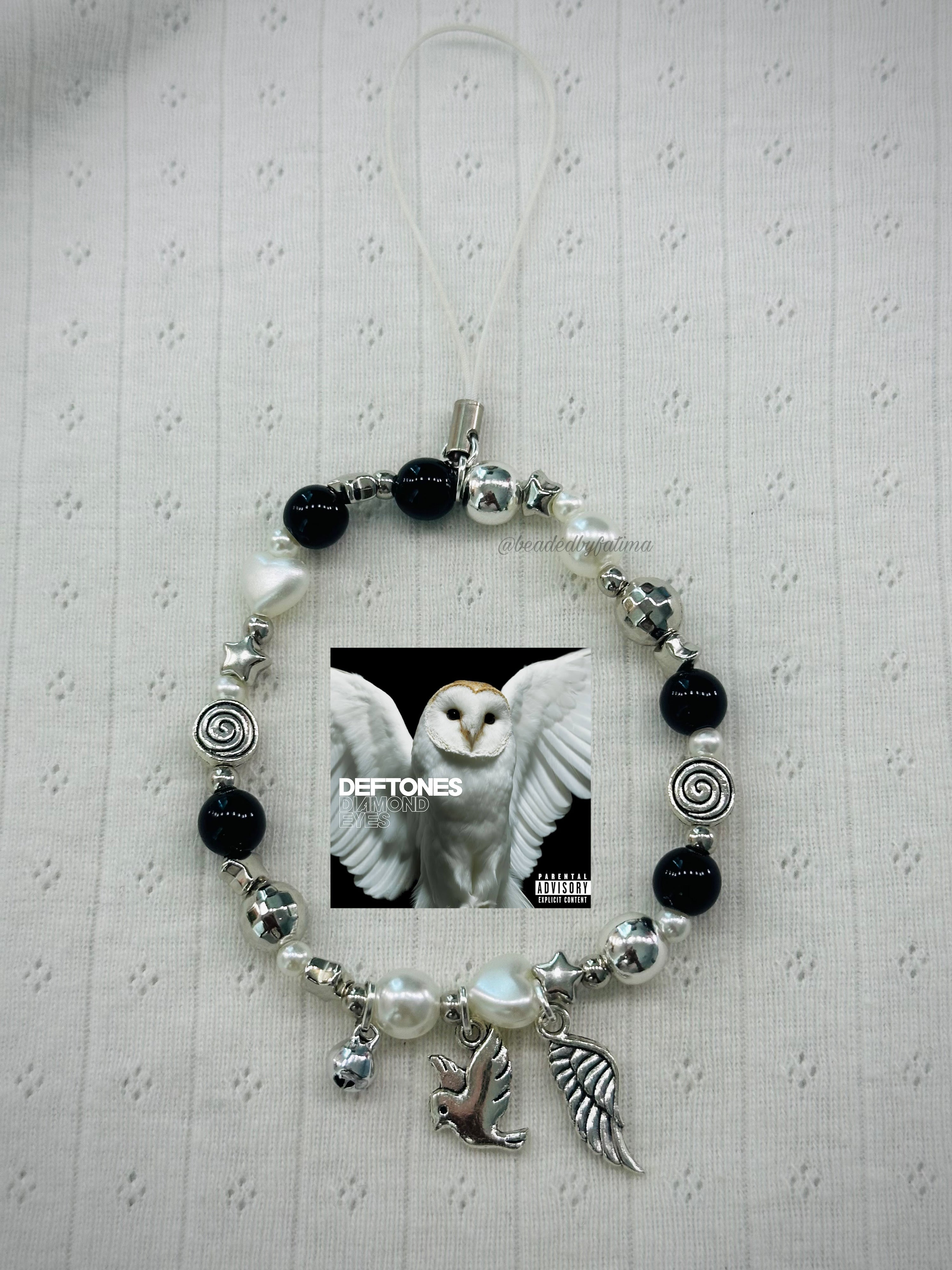 diamond eyes phone charm