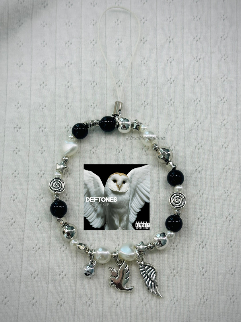 diamond eyes phone charm